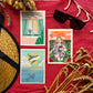 3 cartes postales illustrées sur le thème de l'été, femme dans champ de coquelicot, chat qui dort au bord d'une fenêtre avec glycine, baleine sur ciel bleu dan l'océan avec pièce de puzzle